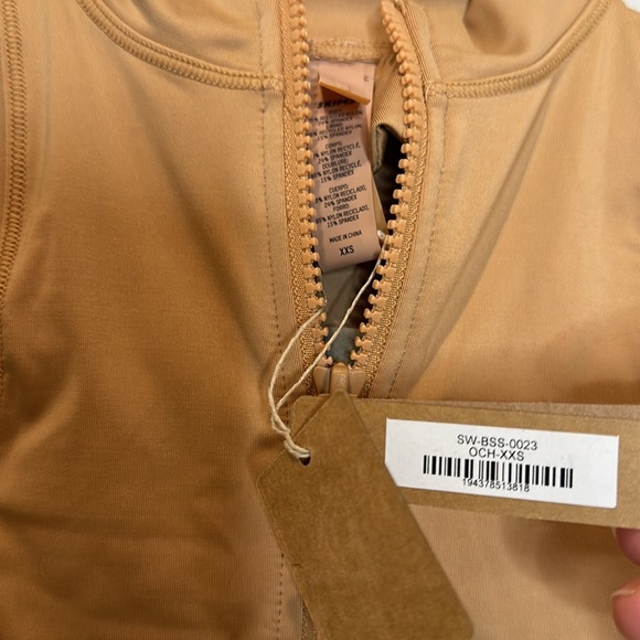 Skims Swim Mock Neck Zip up Cycle Suit Ochre XXS - Picture 4 of 4